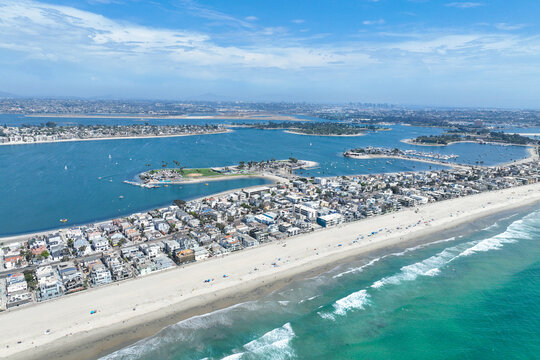 Aerial view of Mission Bay and Beaches in San Diego, California. USA. Community built on a sandbar with villas, sea port and recreational Mission Bay Park. Californian beach-lifestyle.