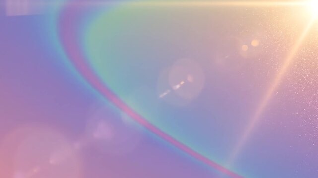 Pastel pink, purple and blue gradient abstract background with soft rainbow light leak and sun lens flare