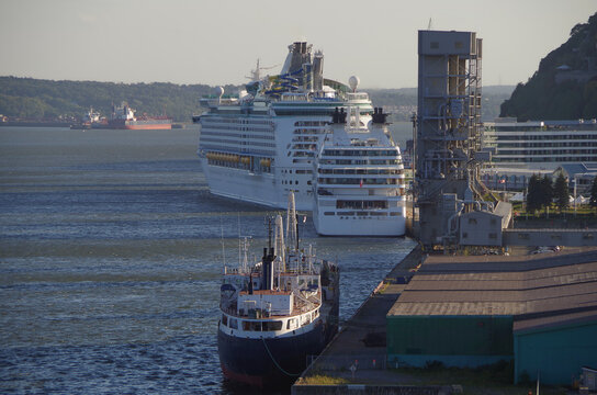Cruiseships cruise ship liners Quest and Adventure docked in Quebec City, Quebec Canada during North America New England Indian summer cruise on St Lawrence River with skyline