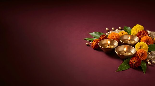 Diwali greeting background with burning oil lamps and flowers