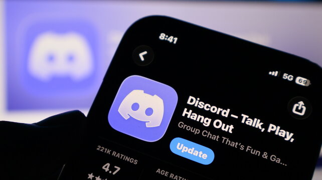 Discord community chat application update button on mobile screen interface.
