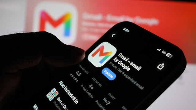 Smartphone screen showing Gmail email by Google application update page for mobile productivity.