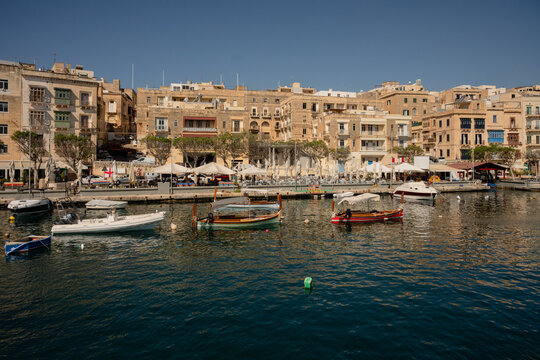 Picturesque harbor with boats in Senglea Malta