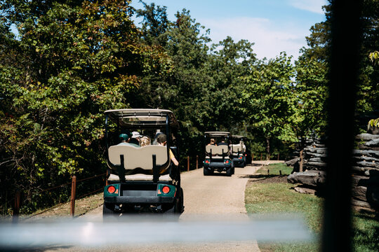 Family On Golf Cart Tour in Midwest