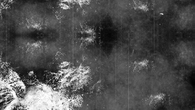 grunge background Dark cloudy hazy surface with scattered white spots and subtle vertical lines seamless loop