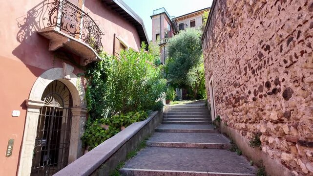 Ascending Scalinata Street in Verona toward Castel San Pietro, following the hillside steps and narrow route to the city&rsquo;s panoramic viewpoint