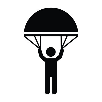 Parachuter in black silhouette jumps with open parachute