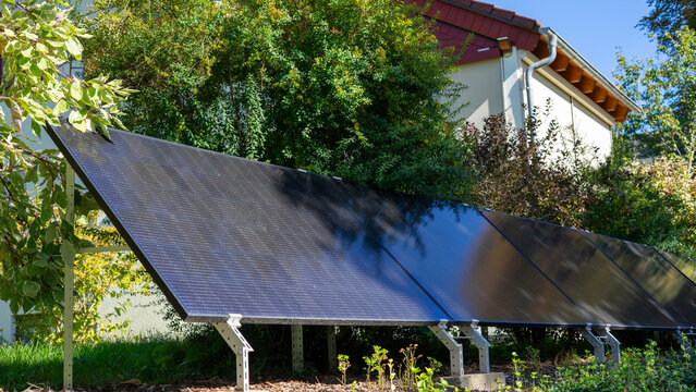 Solar Panels in a Garden at a Modern Single Family Home