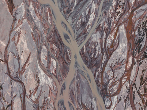 Glacial river braids creating an abstract natural pattern