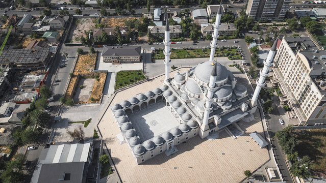 Aerial view of a beautiful modern mosque in the city