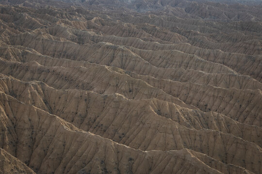Rolling hills of eroded desert badlands landscape