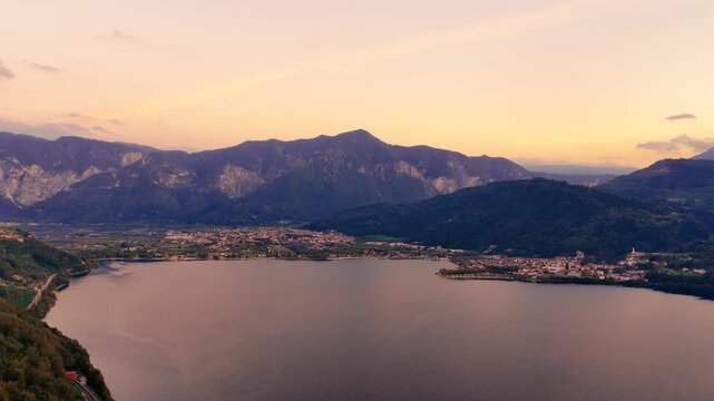 Lake Caldonazzo reflecting warm evening light beneath