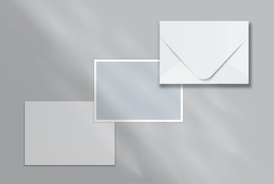 Blank postcard and envelope mockup on a soft background, featuring a minimal layout with realistic shadows for stationery branding, invitation design, wedding cards, gift card and print presentation