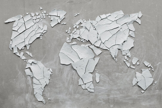 Clay shards forming world map, broken, concept ecological disasters