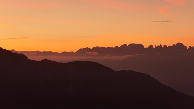 Mountain silhouettes of the Dolomites framed