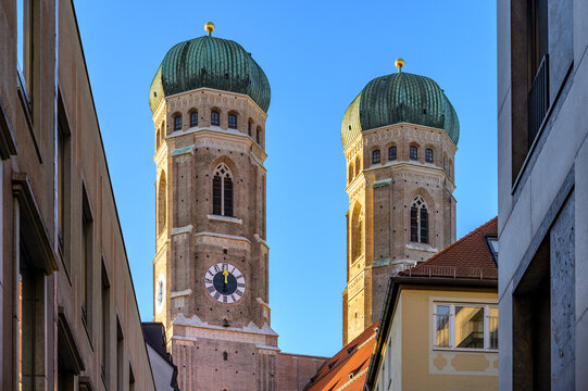 View of the Frauenkirche towers in Munich during warm evening light