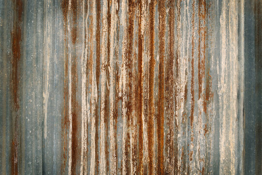 Old zinc wall texture background, rusty on galvanized metal panel sheeting.