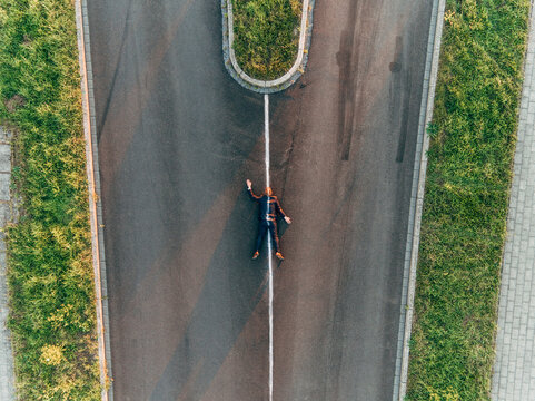 Run over man lying on road