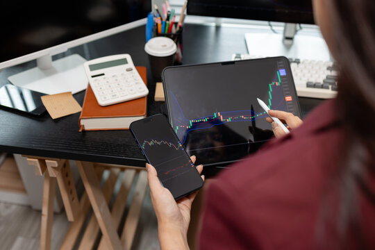 Professional trader monitoring financial markets and analyzing investment opportunities across multiple trading platforms, representing stock analysis, market research.