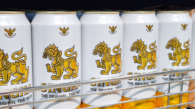 Close up of Singha original Thai beer aluminum cans with golden lion logo on September 30, 2026 in Bangkok, Thailand.