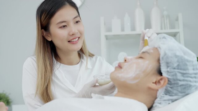 Beautiful woman receive spa and treatment skin of face. face of a healthy woman apply cream. Advertisement for skin cream, anti-wrinkle, baby face, whitening, moisturizer, tighten pores ser