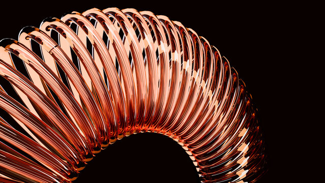 Curved shiny copper-colored metal spring coil isolated