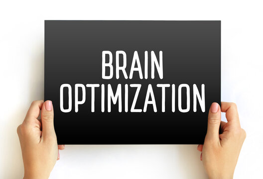 BRAIN OPTIMIZATION text held in hands. Concept for biohacking, mental performance enhancement, and advanced cognitive wellness. Modern approach to brain power.