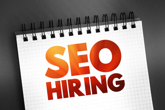 Seo Hiring text quote on notepad, concept background