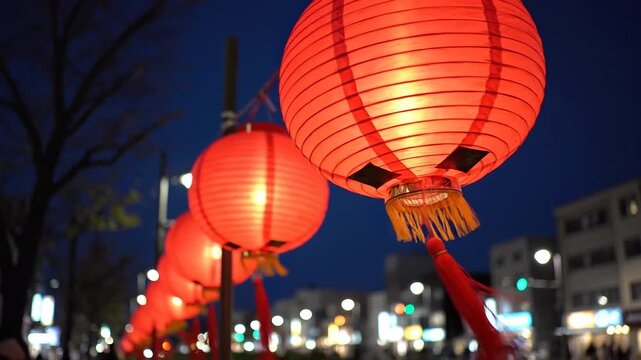 Chinese New Year red lanterns swaying night street celebration