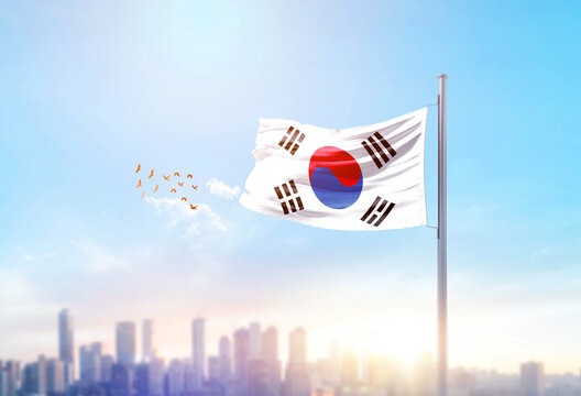 South Korea national flag waving with skyline and buildings. Korean national flag for independence day.