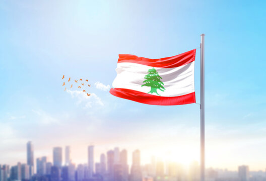 Lebanon national flag waving with skyline and buildings. Lebanon national flag for independence day.