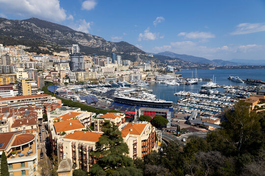 Panoramic view of the Port of Monaco (Port Hercule) and the Monte Carlo district in the Principality of Monaco.