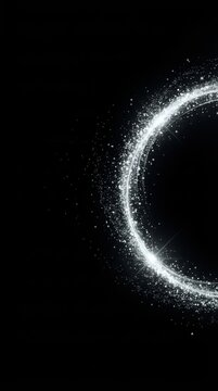 Sparkling silver ring with light particles on a dark background