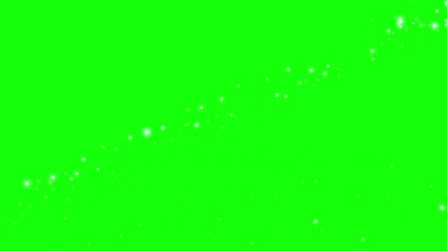 Chroma key green screen background with rising glowing magical stars particles flying