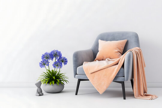 Cozy gray armchair with peach blanket and potted blue flowers in a bright minimalist room