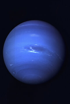 Vertical portrait of Neptune showing its swirling dark vortex and white cirrus streaks