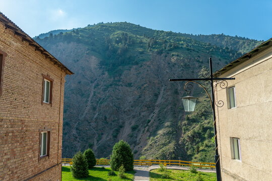 Tourist base near Yangiabad, Uzbekistan, view on a cliff between two accommodation buildings.