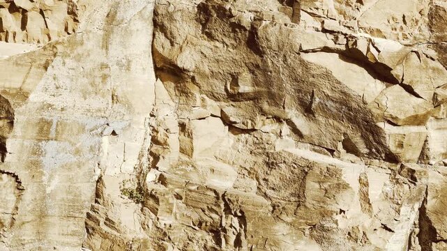 Tuff, a relatively soft, porous rock that is usually formed by the compaction and cementation of volcanic ash or dust. Diamond Head Crater. Oahu, Hawaii. 
