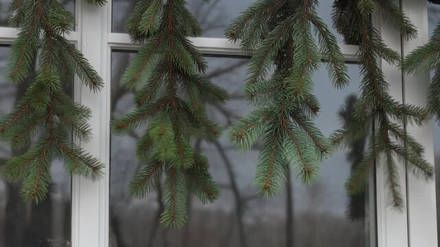 Pine garland swaying in a draught
