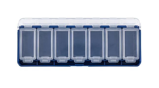 Empty weekly 7 day pill organizer box with plastic compartments for prescription medicine, daily vitamin storage case for healthcare treatment, isolated transparent background cutout PNG