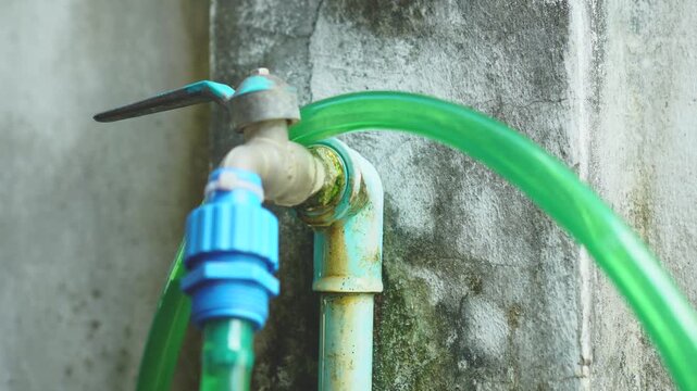 Water is dripping or seeping from the faucet connection.