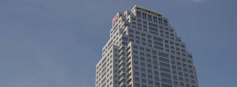 The U Chu Liang building with the prominent HSBC logo soars into a clear blue sky in Thai capital Bangkok