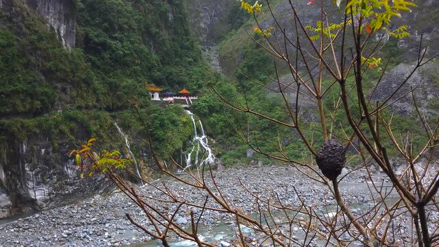 Memorial Changchun Shrine Taoist Temple and Eternal Waterfall Spring on the Rocks of Taroko Gorge National Park in Taiwan - Frontal LS UHD 4K