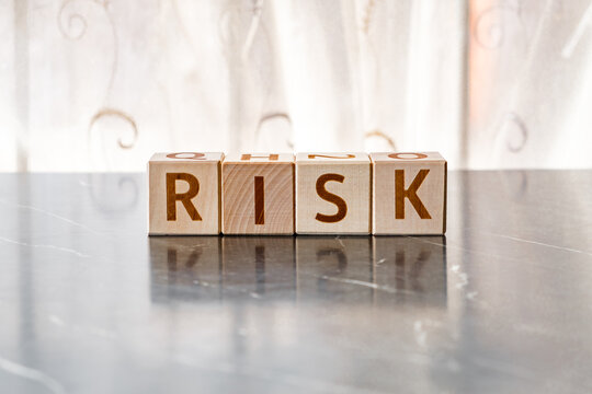 word Risk, from letters on wooden cubes