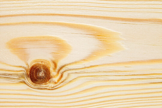 background of a wooden surface with fibers with knots