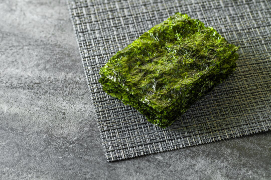 dried nori leaves on grey countertop