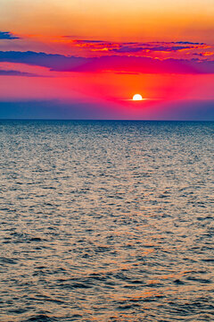 red sunset sun over the sea