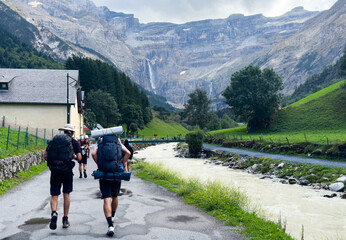 Obraz premium Hiking trail to Gavarnie Falls, spectacular waterfall in french Pyrenees, highest waterfalls in France, popular tourist landmark