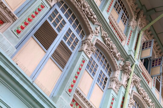 Singapore Little India - old colonial architecture. Colorful windows of Singapore City.