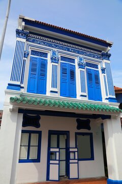 Singapore Little India - old colonial architecture. Colorful windows of Singapore City.